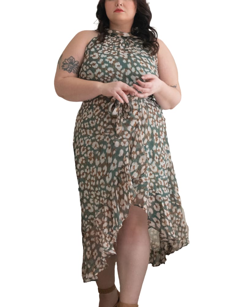Front of a model wearing a size XL Clemence Midi Dress Asymmetrical Faux Wrap Halter in Green by ANNICK. | dia_product_style_image_id:282086